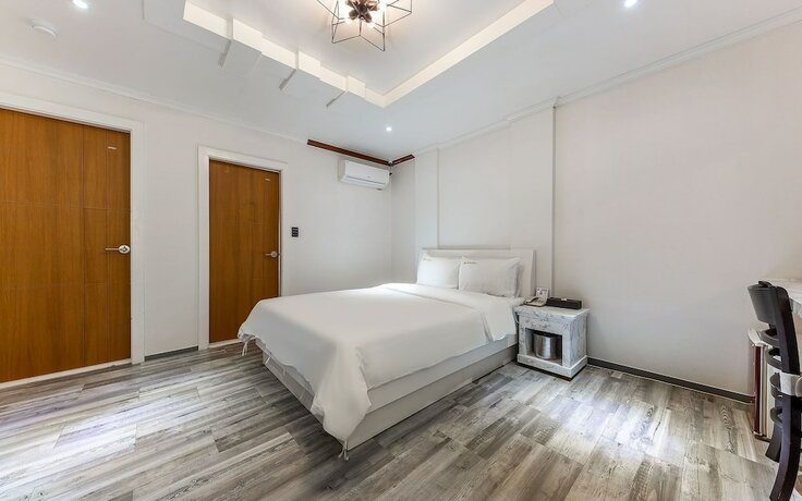 Imagen de la habitación del Hotel Shiheung New Rose. Foto 20