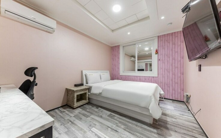 Imagen de la habitación del Hotel Shiheung New Rose. Foto 23