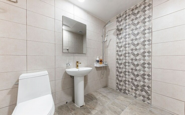 Imagen de la habitación del Hotel Shiheung New Rose. Foto 25