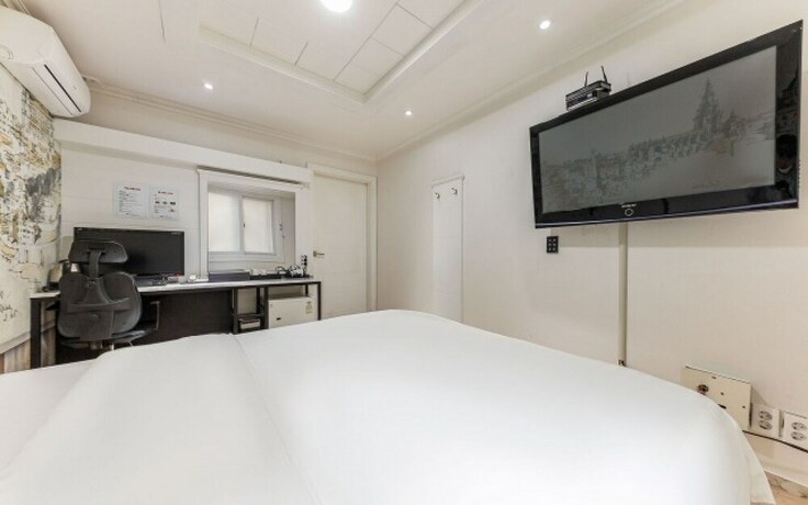 Imagen de la habitación del Hotel Shiheung New Rose. Foto 26
