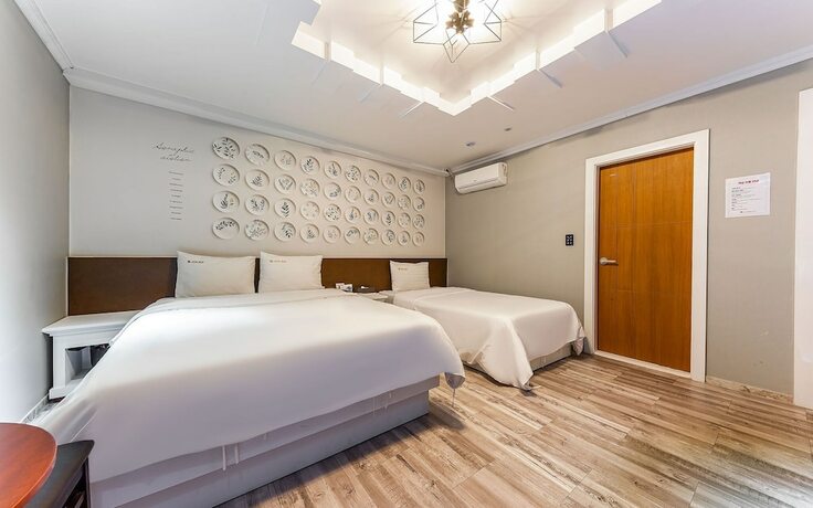 Imagen de la habitación del Hotel Shiheung New Rose. Foto 28
