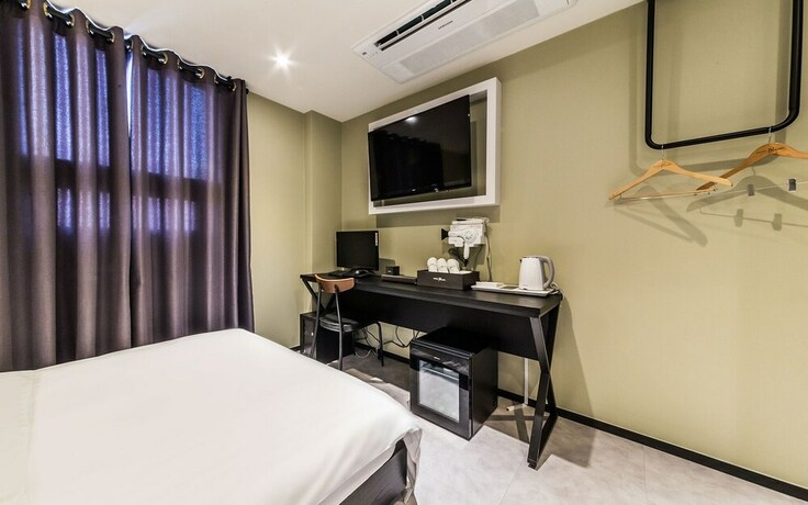 Imagen de la habitación del Hotel Shiheung Plum. Foto 23