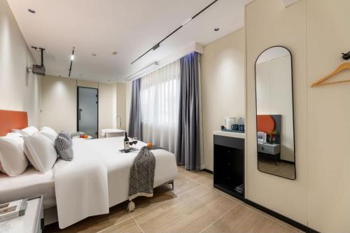 Imagen de la habitación del Hotel Shijia Luo - Guangzhou Beijing Road Pedestrian Street. Foto 16