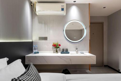 Imagen de la habitación del Hotel Shijia Luo - Guangzhou Beijing Road Pedestrian Street. Foto 18