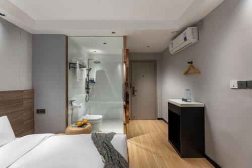 Imagen de la habitación del Hotel Shijia Luo - Guangzhou Beijing Road Pedestrian Street. Foto 20