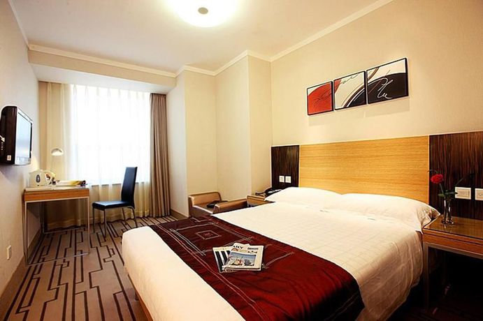 Imagen de la habitación del Hotel Shijiazhuang Grand Milea. Foto 5