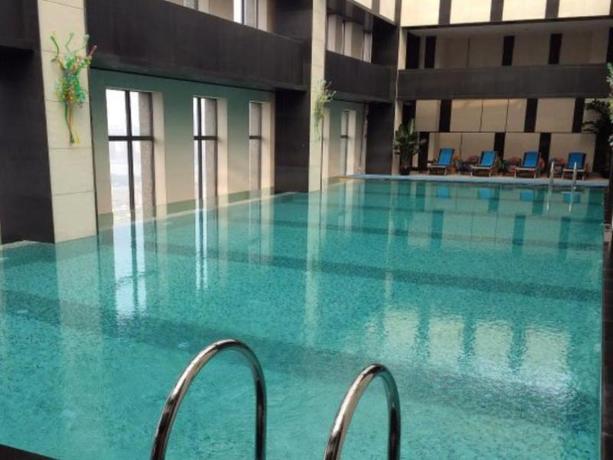 Imagen de la piscina del Hotel Shijiazhuang Ximeijin Continental Hotel. Foto 10