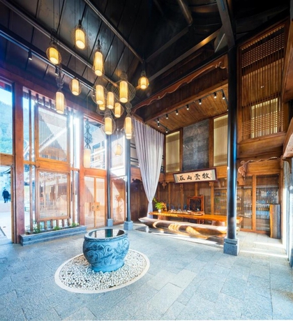 Imagen de los interiores del Hotel Shilily Travelling Lugu Lake. Foto 18