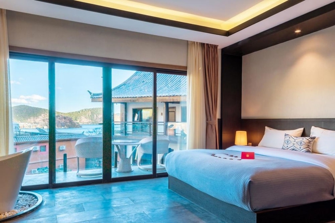 Imagen de la habitación del Hotel Shilily Travelling Lugu Lake. Foto 5