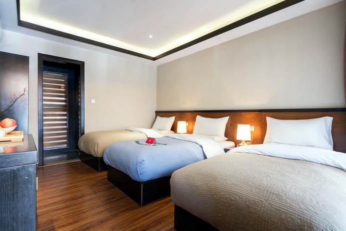 Imagen de la habitación del Hotel Shilily Travelling Lugu Lake. Foto 11