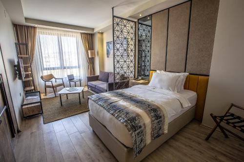 Imagen de la habitación del Hotel Shimall. Foto 8