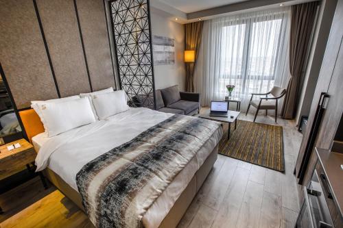 Imagen de la habitación del Hotel Shimall. Foto 9
