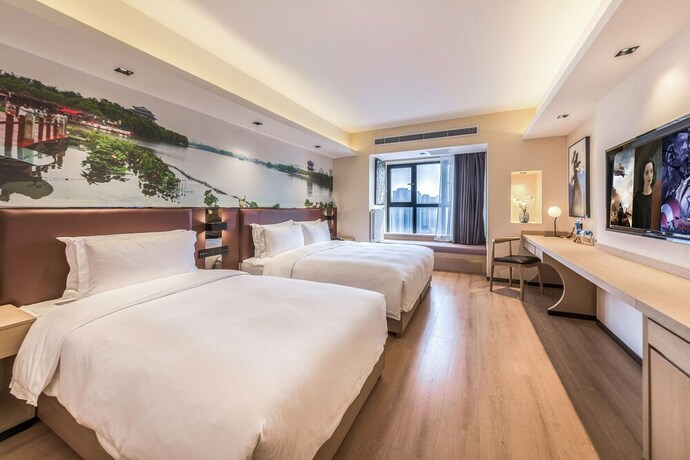 Imagen de la habitación del Hotel Shimao Rui Selected Shangpin. Foto 18