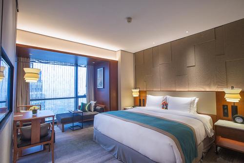 Imagen de la habitación del Hotel Shimao Yuluxe Chengdu. Foto 7