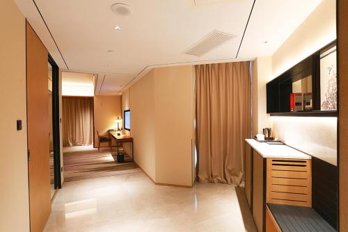 Imagen de la habitación del Hotel Shimao Yuluxe Chengdu. Foto 8