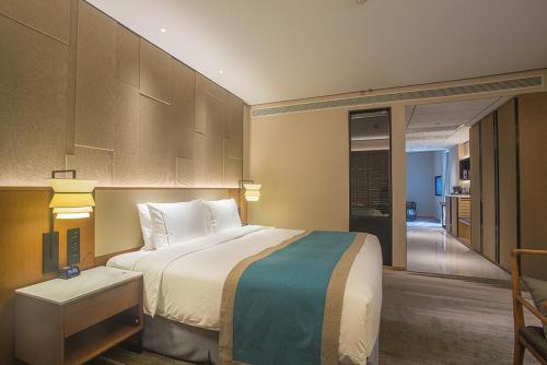 Imagen de la habitación del Hotel Shimao Yuluxe Chengdu. Foto 9