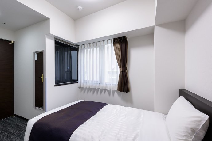 Imagen de la habitación del Hotel Shimbashi Urban. Foto 12