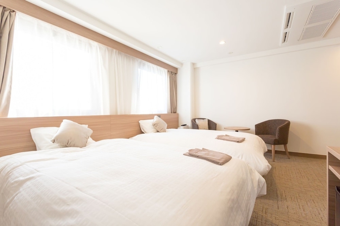 Imagen de la habitación del Hotel Shimizu City. Foto 7