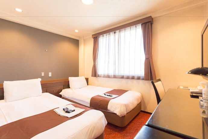Imagen de la habitación del Hotel Shimizu City. Foto 10