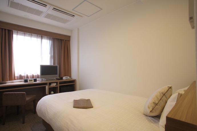 Imagen de la habitación del Hotel Shimizu City. Foto 14