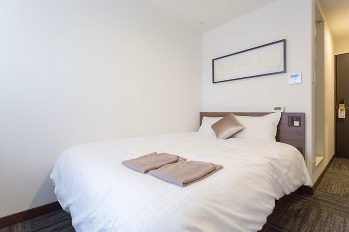 Imagen de la habitación del Hotel Shimizu City. Foto 17