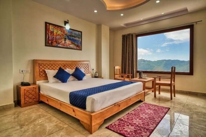 Imagen de la habitación del Hotel Shimla Alpine Regency. Foto 14