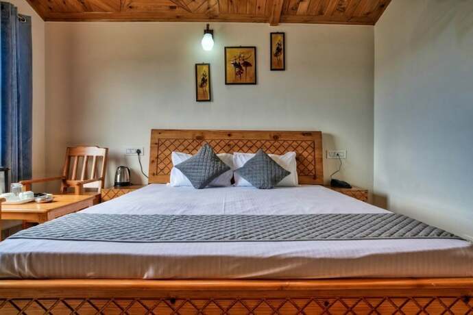 Imagen de la habitación del Hotel Shimla Alpine Regency. Foto 16