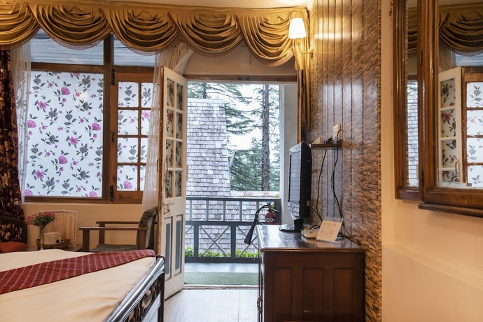 Imagen de la habitación del Hotel Shimla British Resort. Foto 3