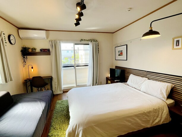 Imagen de la habitación del Hotel Shimokitazawa Akima 202. Foto 25