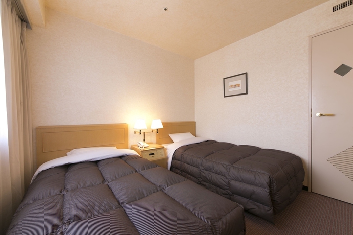 Imagen de la habitación del Hotel Shimonoseki Station West Washington Plaza. Foto 11