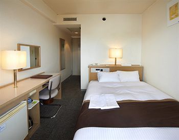 Imagen de la habitación del Hotel Shin Osaka Sunny Stone. Foto 8