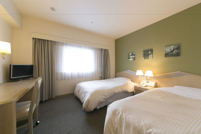 Imagen de la habitación del Hotel Shin Osaka Washington Plaza. Foto 6