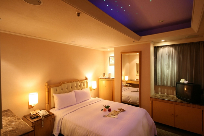 Imagen de la habitación del Hotel Shin Shih. Foto 2