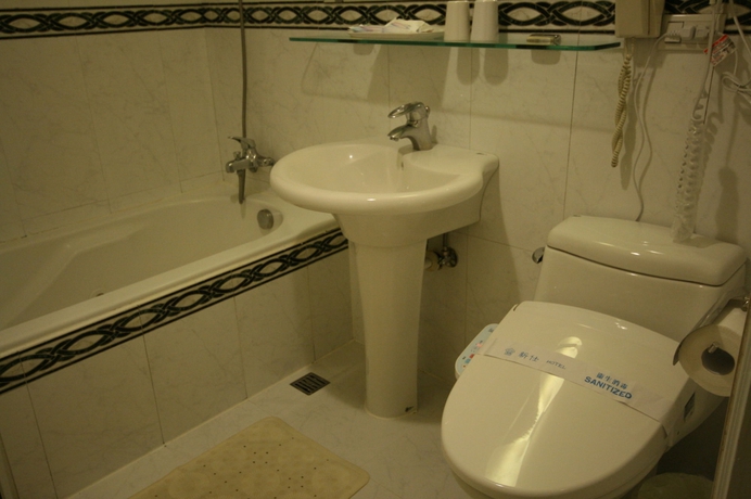 Imagen de la habitación del Hotel Shin Shih. Foto 4
