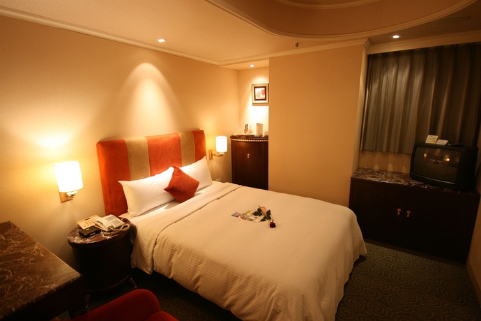 Imagen de la habitación del Hotel Shin Shih. Foto 6