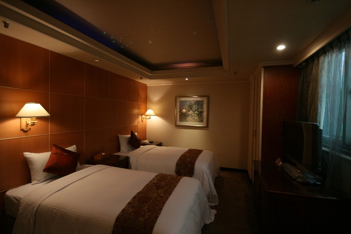 Imagen de la habitación del Hotel Shin Shih. Foto 7