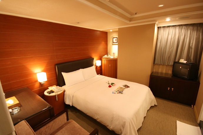 Imagen de la habitación del Hotel Shin Shih. Foto 8