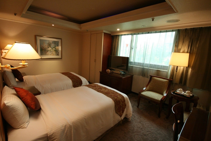 Imagen de la habitación del Hotel Shin Shih. Foto 9