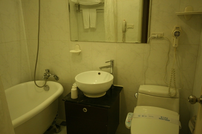 Imagen de la habitación del Hotel Shin Shih. Foto 10
