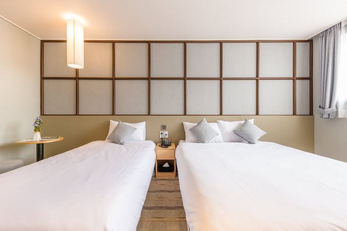 Imagen de la habitación del Hotel Shin Shin Cheonjiyeon. Foto 7