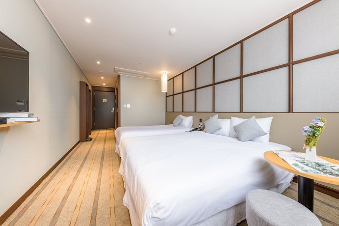 Imagen de la habitación del Hotel Shin Shin Cheonjiyeon. Foto 11