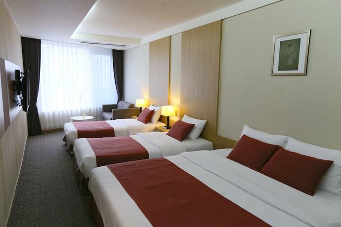 Imagen de la habitación del Hotel Shin Shin Jeju Worldcup. Foto 5