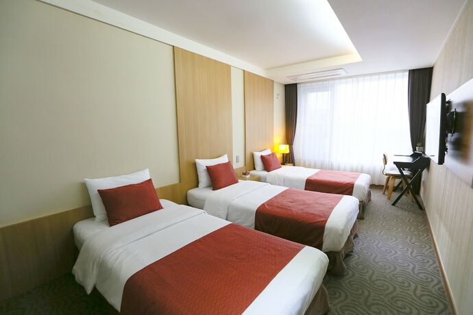 Imagen de la habitación del Hotel Shin Shin Jeju Worldcup. Foto 6