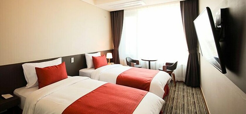 Imagen de la habitación del Hotel Shin Shin Jeju Worldcup. Foto 7