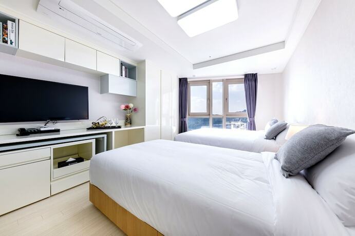 Imagen de la habitación del Hotel Shin Shin Seogwipo. Foto 12