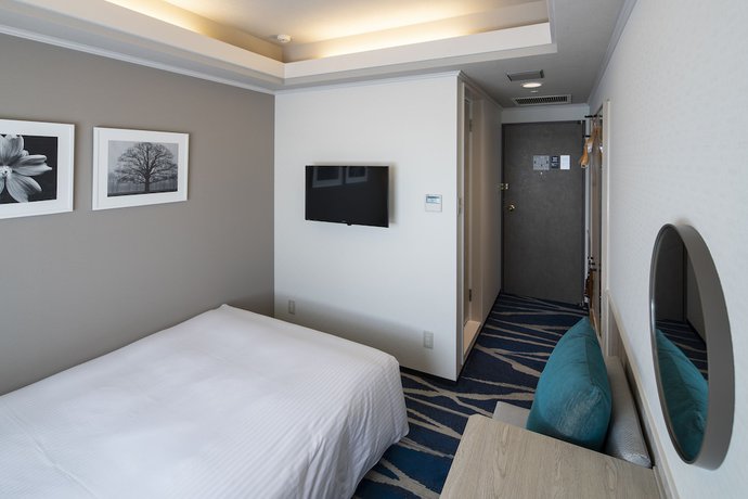 Imagen de la habitación del Hotel Shin Yokohama Grace. Foto 14