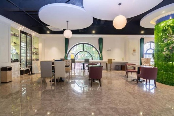 Imagen del bar/restaurante del Hotel Shine Apartment. Foto 10