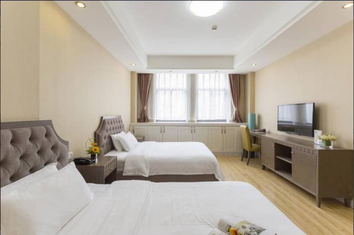 Imagen de la habitación del Hotel Shine Apartment. Foto 11