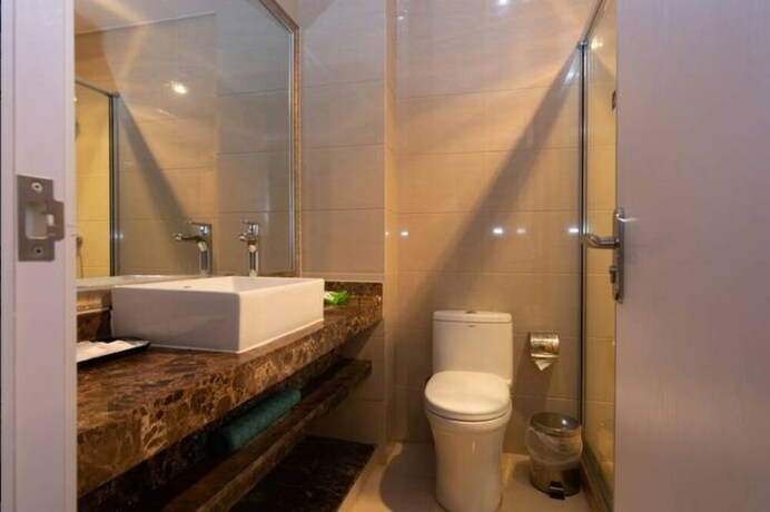 Imagen de la habitación del Hotel Shine Apartment. Foto 22