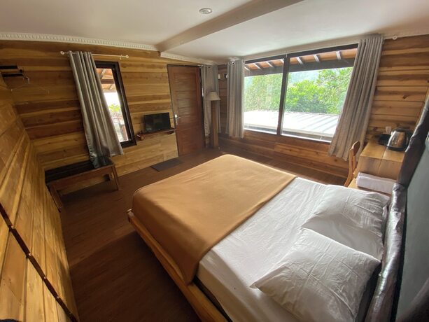 Imagen de la habitación del Hotel Shine River Ciwidey. Foto 18